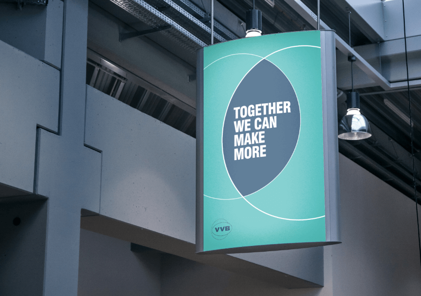 Hanging sign with 'together we can make more' text and the VVB logo